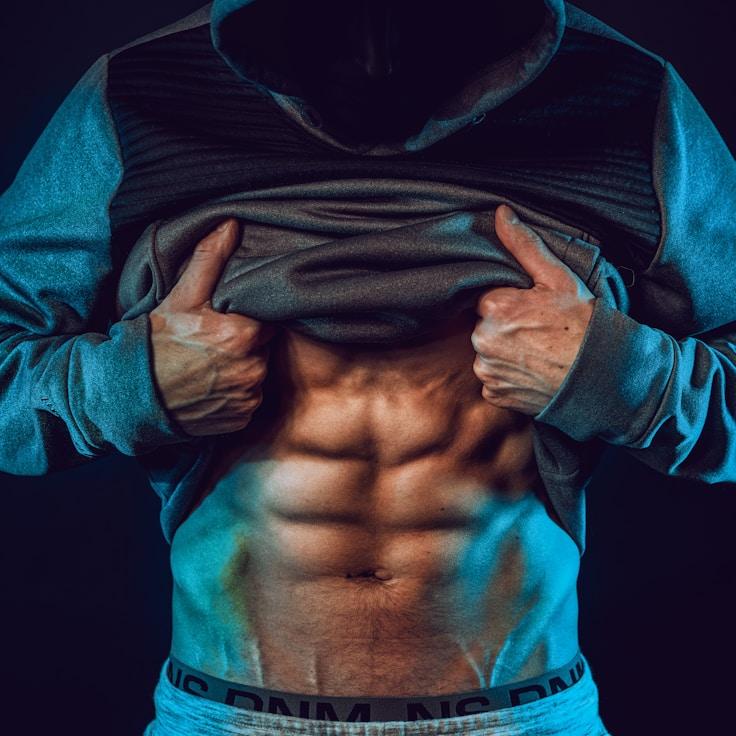 Women in a fitness class doing stretching and mobility exercises
